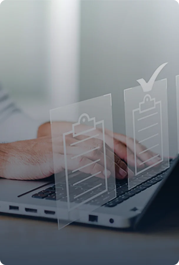 close up of a person typing on a laptop